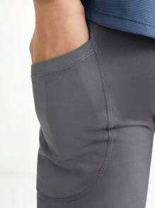 SHEIN Sporty Gray Yoga Pants For Tween Boys, Elastic, Comfortable, Breathable And Sweat-Absorbing With Fashionable Knot, Suitable For Training, Running And Cycling