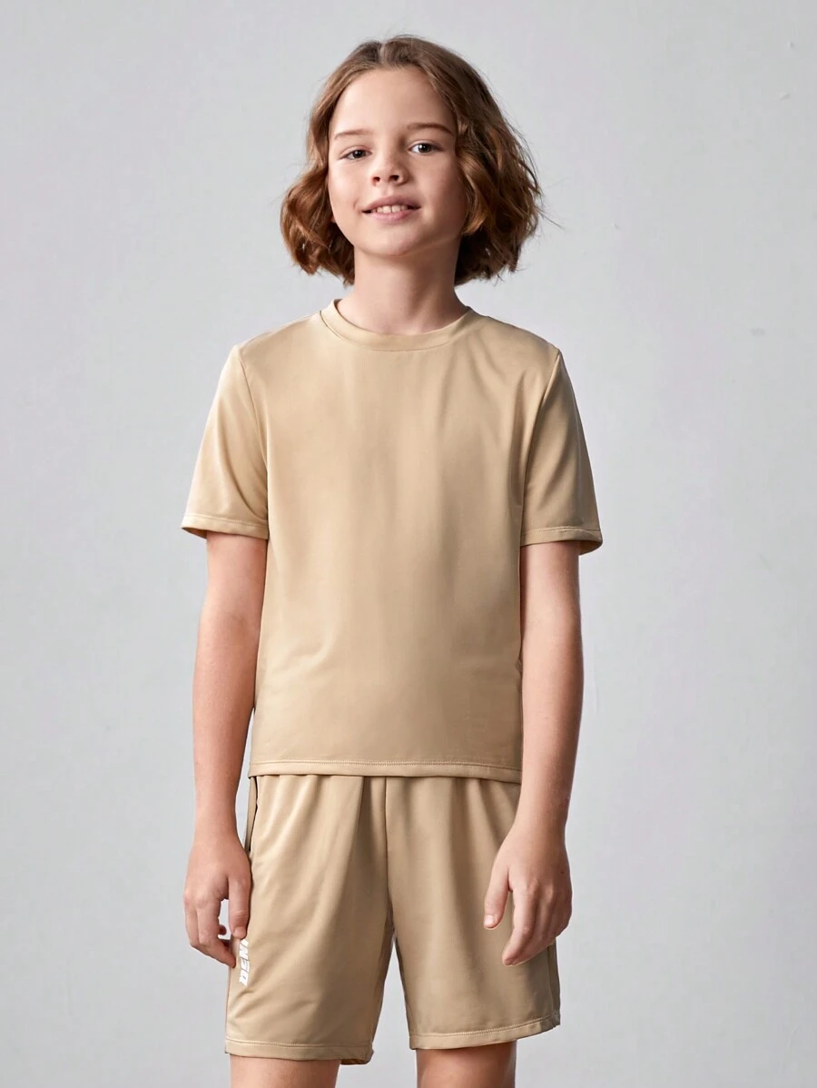SHEIN Tween-Jungen Gestricktes, einfarbiges, kurzärmeliges T-Shirt mit Reißverschlusstasche und Shorts mit Kordelzug, lässiges 2-teiliges Outfit - Aprikosenfarben - Übersicht 1