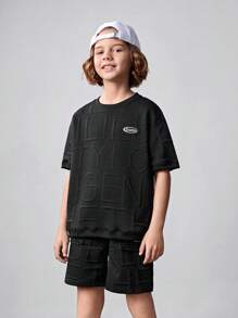 SHEIN Conjunto casual de 2 piezas para niños preadolescentes, que incluye camiseta de manga corta de punto unicolor con parches de letras y pantalones cortos con bolsillo