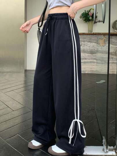 DAZY 女式休闲撞色拼布前系带口袋长裤运动裤