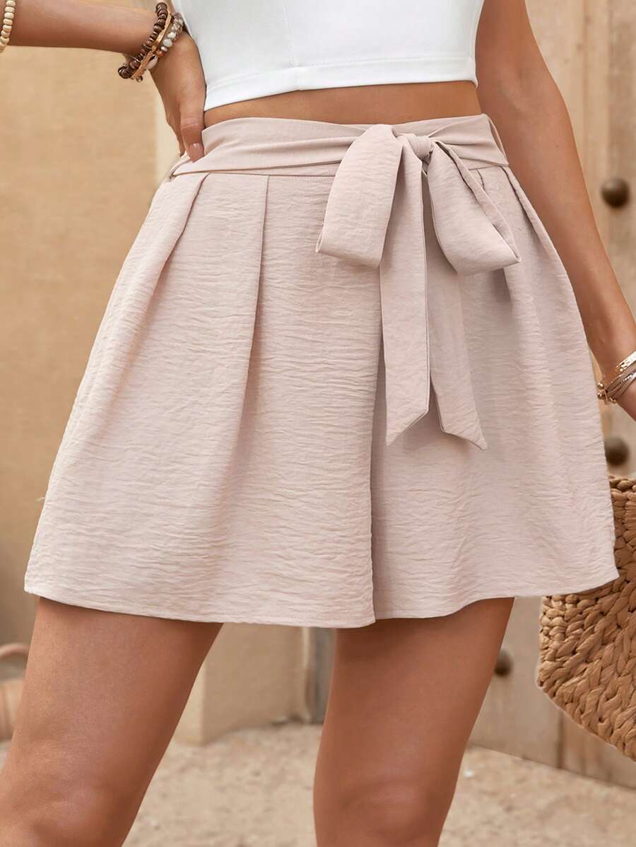 SHEIN LUNE Pantalones cortos tipo culottes casuales de vacaciones con textura de lazo de moño elástico en la cintura para mujer talla grande - Albaricoque - Ver 1