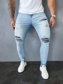 Manfinity LEGND Jeans pitillo de denim azul claro desgastados para hombres - Lavado ligero - Ver 1