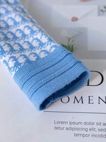 SHEIN 2pcs/Set Young Girl Knitted Cardigan Sweater And Mini Skirt Outfit, New Fashion For Fall/Winter. The Light Blue Soft Fabric And Gentle Pattern Make The Garment Elegant And Sweet. The Charming Bow Adds A Lively And  Touch. The Buttons Are Exquisite And Luxurious. Suitable For Wearing In Autumn And Winter. The Soft And Skin-Friendly Material Is Lightweight And Comfortable, Making It More Cozy To Wear. Suitable For Various Occasions, The Cardigan Is Easy To Put On And Off To Better Adapt To The Autumn And Winter Climate, And The Mini Skirt Can Be Matched With Other Styles To Show The Academic Good Girl Vibe, Suitable For Home Leisure, Campus Gatherings, Street Walks, Holiday Parties, And More. - Blue - View 7