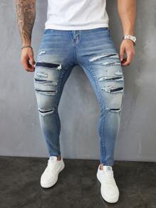 Manfinity LEGND Jeans vaqueros slim fit de hombre de color azul claro lavado y desgastado