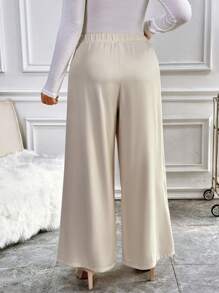 Flirla Plus Size Women's Solid Color Casual Pants With Button Decor - Apricot - View 2