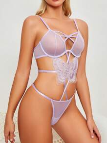 Damen Jumpsuit aus besticktem transparenten Mesh mit Schmetterlingen