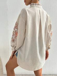 EURMUSE Women's Vacation Style Embroidered Lantern Sleeve Fringe Tie-Front Blouse - Beige - View 2