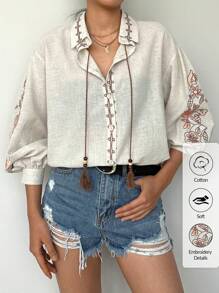 EURMUSE Women's Vacation Style Embroidered Lantern Sleeve Fringe Tie-Front Blouse - Beige - View 1