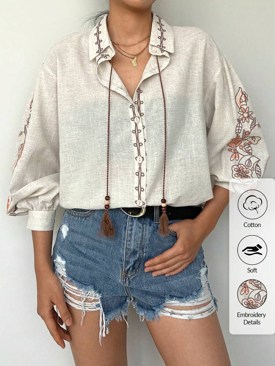 EURMUSE Women's Vacation Style Embroidered Lantern Sleeve Fringe Tie-Front Blouse - Beige - View 1