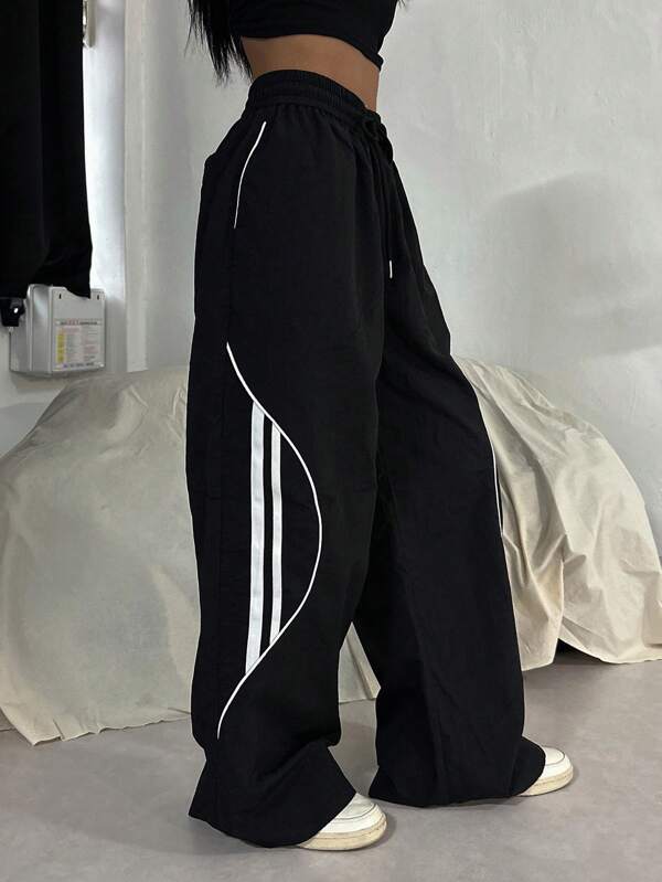 DAZY Pantalones casuales con bolsillo, corte delantero y empalme a rayas para mujer, estilo Y2K