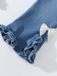 Pantalones de mezclilla acampanados con bolsillo y decoración de lazo para bebé niña - Lavado ligero - Ver 3