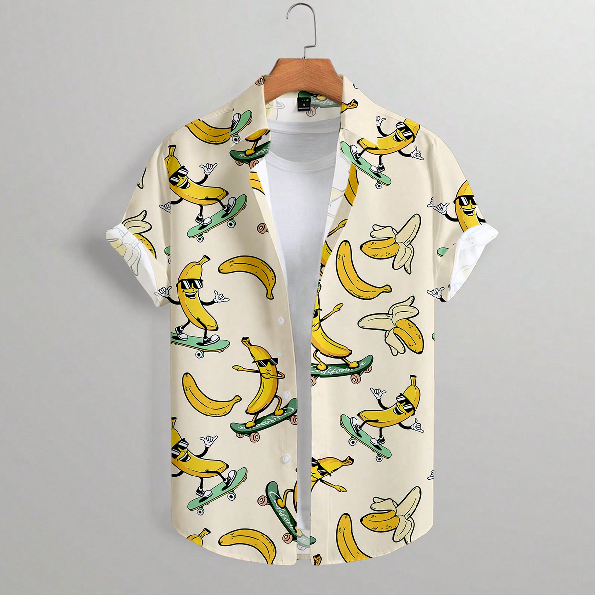 Camisa casual de vacaciones de manga corta con botones y estampado de plátanos de dibujos animados para hombres