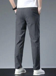Pantalones casuales de unicolor con bolsillos y corte entallado para hombre, para otoño - Gris Oscuro - Ver 2