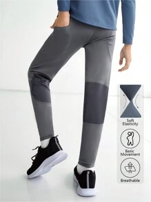 SHEIN Sporty Gray Yoga Pants For Tween Boys, Elastic, Comfortable, Breathable And Sweat-Absorbing With Fashionable Knot, Suitable For Training, Running And Cycling