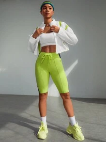 SHEIN Sport Studio Shorts deportivos ajustados de unicolor con bolsillo y cordones delanteros, uso casual de todos los días