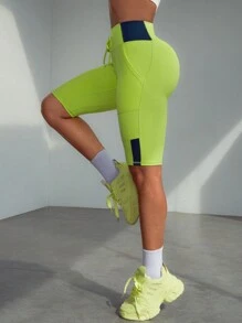SHEIN Sport Studio Shorts deportivos ajustados de unicolor con bolsillo y cordones delanteros, uso casual de todos los días