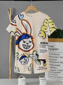 SHEIN 2pcs Tween Girls' Loose Fit Graffiti Print Crew Neck Short Sleeve T-Shirt And Shorts Set - Apricot - View 1