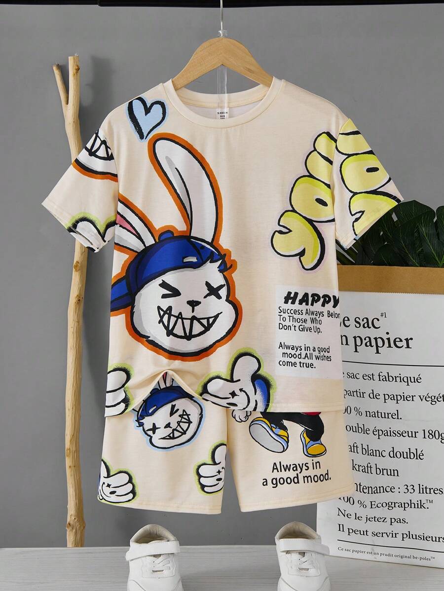 SHEIN 2pcs Tween Girls' Loose Fit Graffiti Print Crew Neck Short Sleeve T-Shirt And Shorts Set - Apricot - View 1
