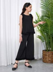 SHEIN Set da 2 pezzi per ragazze giovani, con top senza maniche con scollo tondo e pantaloni casual e larghi, in maglia con contrasto - nero - Visualizzare 5