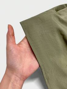 Manfinity Hypemode Chaleco sin mangas de unicolor para hombres con cuello y cremallera frontal, ropa casual diaria