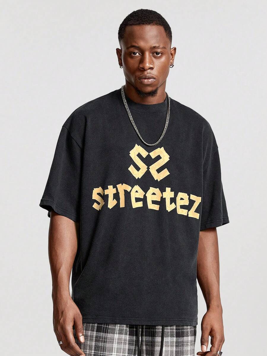 Manfinity NXTstreet Men's Loose Fit Round Neck Short Sleeve T-Shirt With Snowflake & English Print, Suitable For Summer - Black - View 1