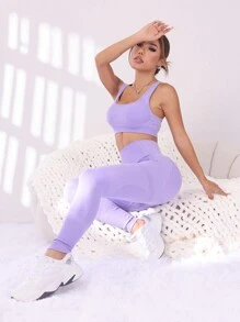 Easithlete Conjunto de ropa deportiva de color liso con top corto y mallas sin costuras para mujer - Morado - Ver 1