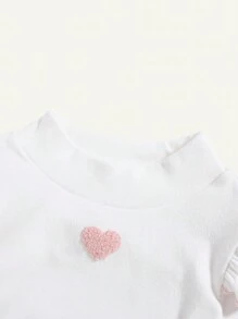 Cozy Pixies Parte superior con cuello de volantes de punto y estampado de corazón para bebé niña - Blanco - Ver 4