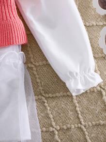 Ensemble pull et robe en tricot mignon et simple pour bébé fille en automne et hiver. Artisanat délicat de qualité, avec un nœud décoratif qui montre l'élégance princière. La jupe en tulle rend les filles charmantes et mignonnes. Les bordures à volants sont adorables. Convient pour la maison, les sorties, les dîners, les fêtes, la cour de récréation et plus encore. - Multicolore - Voir 3