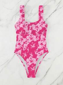 Maillot de bain une-pièce slim à fines bretelles avec imprimé floral tout-sur-tout. Tenue de vacances décontractée pour l'été