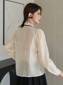 DAZY Blusa elegante y encantadora de contraste de color con cuello alto, lazo, cordón y manga larga para mujer