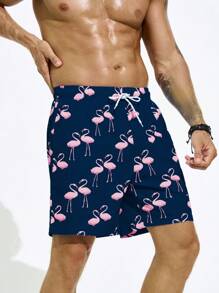 Manfinity Swimmode Bañadores sueltos y tipo short con estampado de flamencos para vacaciones de verano de los hombres, con forro de seda de leche, estilo hawaiano