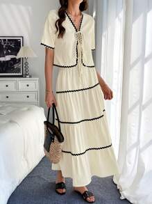Calvaya 2 piezas Conjunto de top de manga corta y mini falda con adorno floral elegante para mujer