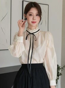 DAZY Blusa elegante y encantadora de contraste de color con cuello alto, lazo, cordón y manga larga para mujer