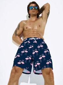 Manfinity Swimmode Bañadores sueltos y tipo short con estampado de flamencos para vacaciones de verano de los hombres, con forro de seda de leche, estilo hawaiano