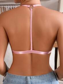 Sujetador sexy de halter con decoración de metal hueco para mujer