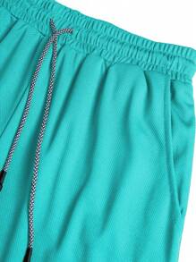 Manfinity Sport Corelite Pantalones cortos deportivos minimalistas de unicolor de estilo informal para hombre, para la escuela - Celeste - Ver 3