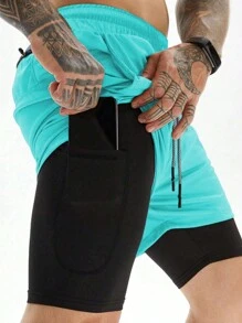 Manfinity Sport Corelite Pantalones cortos deportivos minimalistas de unicolor de estilo informal para hombre, para la escuela - Celeste - Ver 1