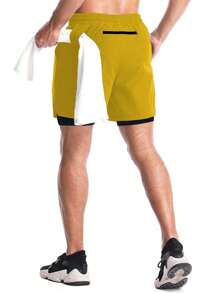 Manfinity Fitness Shorts deportivos de bolsillo de unicolor y estilo informal para hombre