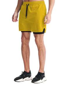 Manfinity Fitness Shorts deportivos de bolsillo de unicolor y estilo informal para hombre