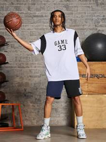 Gym Rark Short de sport style boyfriend pour hommes avec lien à l'avant, imprimé bloc de couleurs et lettres. Short décontracté pour l'école et le quotidien, pantalon de survêtement noir - Noir - Voir 4