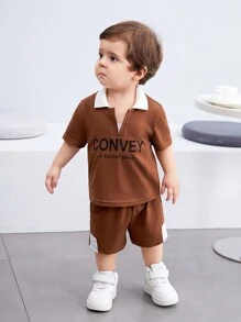 SHEIN Set di polo a maniche corte a righe multicolore con lettere sulla soffice maglia a trama grossa e pantaloncini a vita elastica, adatti per l"estate, per neonati maschi e femmine.