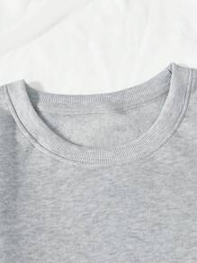 SHEIN x Carly Lawrence INAWLY Sudadera holgada casual de manga larga con cuello redondo, caída de hombros y estampado de calavera de calabaza para mujeres en primavera y otoño