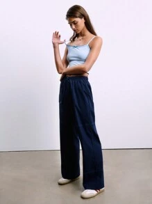 SHEIN Unity Top tipo camiseta slim fit con bloque de color, decorado con lazo de encaje