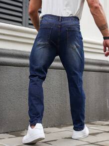 Manfinity EMRG Pantalones vaqueros de mezclilla desgastados con botones delanteros y múltiples bolsillos para hombres de talla grande, para uso casual de todos los días