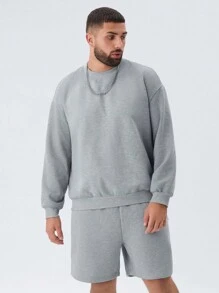 Manfinity NXTstreet Conjunto de 2 piezas, sudadera con capucha de cuello redondo y hombros caídos informal y pantalón corto recto con cordón en la cintura para hombre talla grande