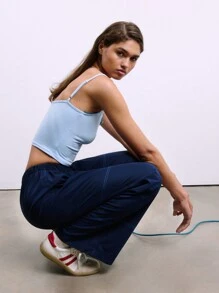 SHEIN Unity Top tipo camiseta slim fit con bloque de color, decorado con lazo de encaje