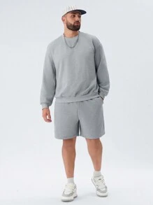 Manfinity NXTstreet Conjunto de 2 piezas, sudadera con capucha de cuello redondo y hombros caídos informal y pantalón corto recto con cordón en la cintura para hombre talla grande
