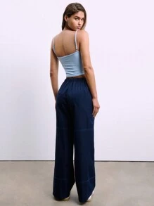 SHEIN Unity Top tipo camiseta slim fit con bloque de color, decorado con lazo de encaje