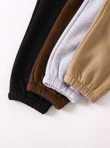 SHEIN 4 件套年轻女孩简约休闲街头时尚服装套装，包括裤子、运动裤