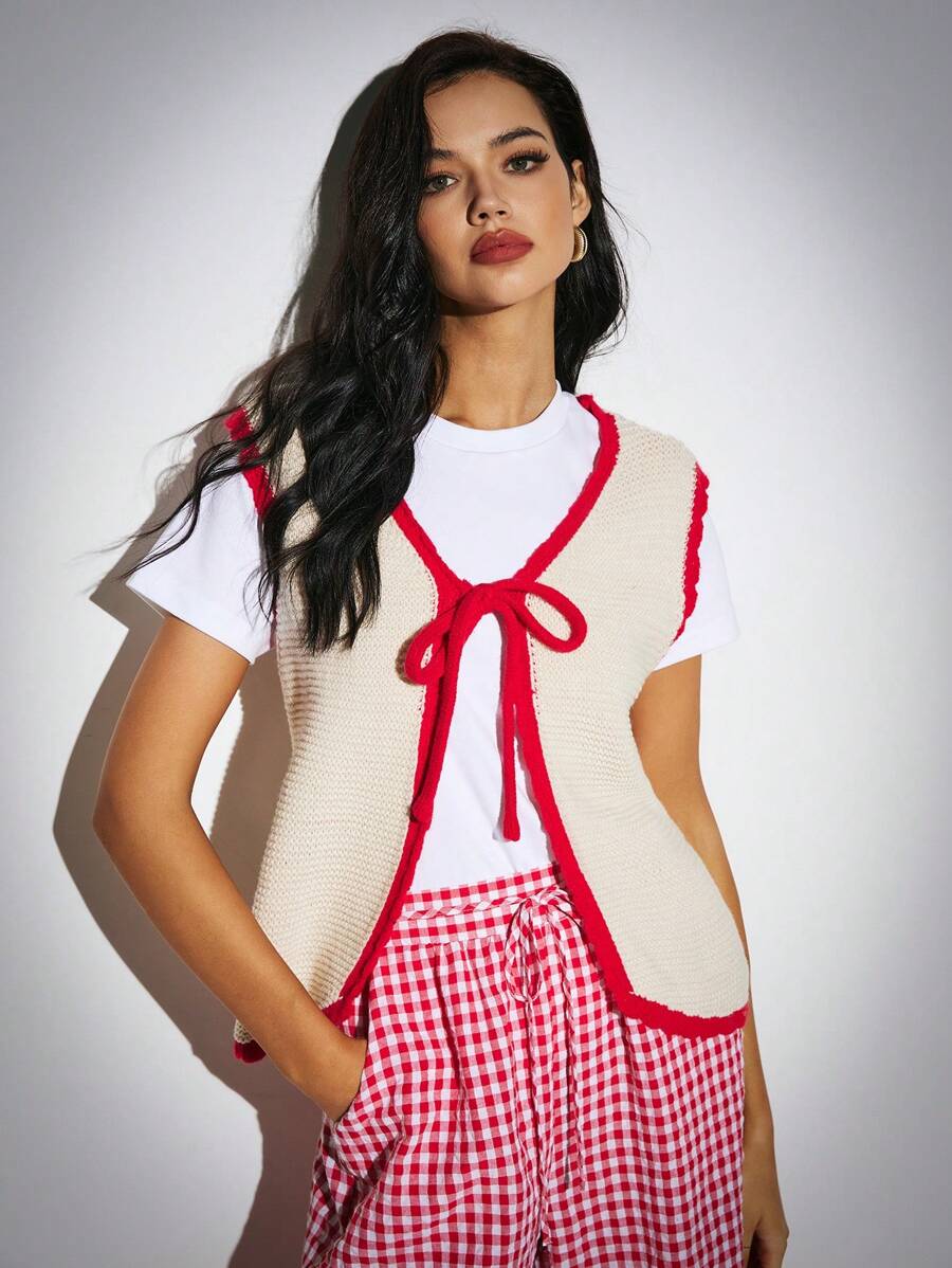 Poéselle Gilet in maglia rossa con bordi a contrasto, gilet in maglia con fiocco centrale e lacci, abbigliamento da donna, abbigliamento autunnale da donna, abbigliamento invernale, gilet con lacci, maglione senza maniche da donna con bordo a contrasto e fiocco anteriore, caldo e confortevole, adatto per uso quotidiano, strada, pendolarismo, vacanze, abbigliamento domestico - Albicocca - Visualizzare 1